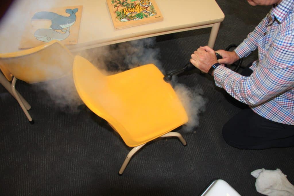 Steam sanitise and remove grime from kids desk chairs