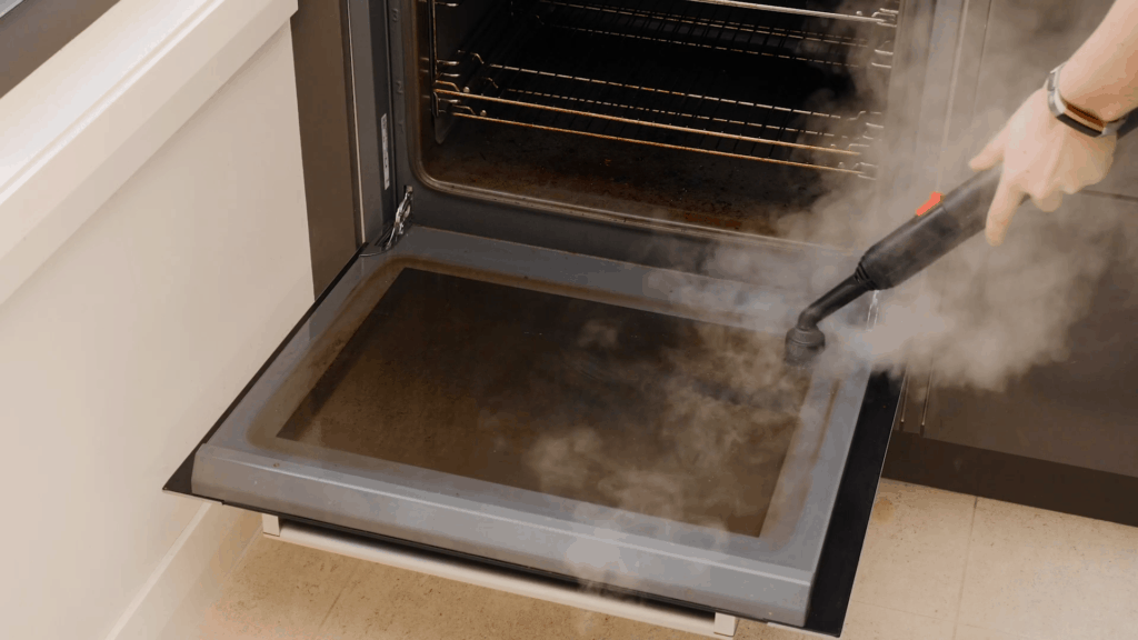 oven door steam cleaning grease and grime