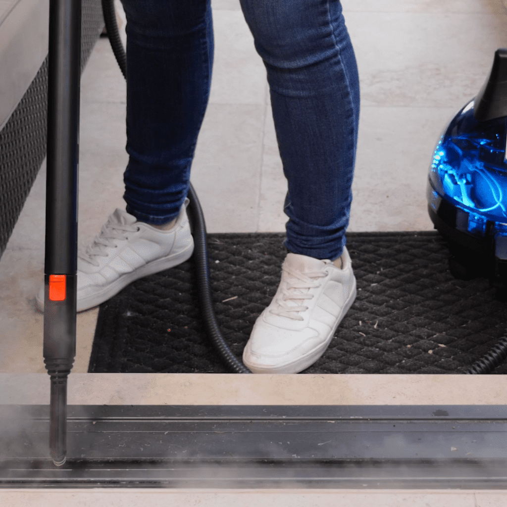 cleaning tricky sliding door tracks with steam cleaner