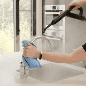 steam sanitising tapware in kitchen