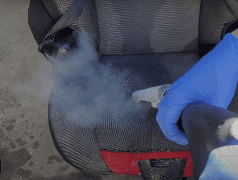 dry steam cleaning child car seat with upholstery tool