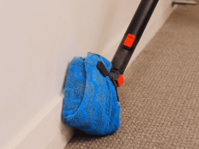 Skirting board cleaning and carpet sanitising with dry steam cleaner